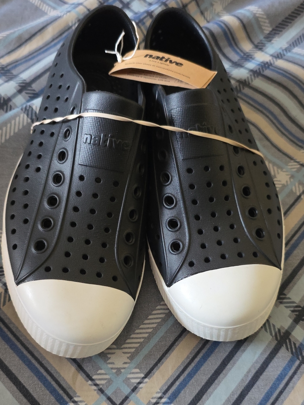 Native Men's/ Women's Slip-On Sneakers in Black with White Toe Caps